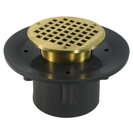 Jones Stephens 3in. x 4in. Heavy Duty PVC Slab Drain Base with 3in. Metal Spud and 5in. Polished Brass Strainer D49419